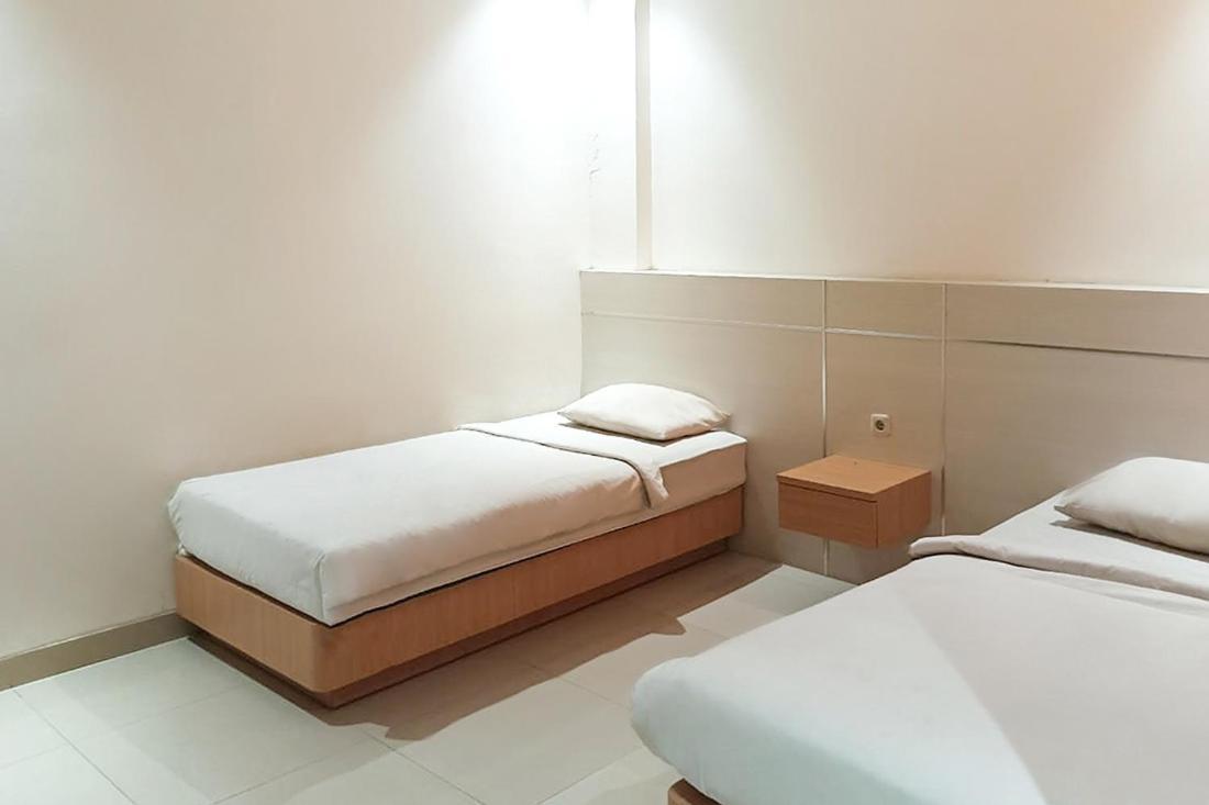 Twospaces Living At Kr Hotel Palembang Exterior photo